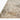 Beige and ocean-colored Loloi Rugs Axel AXE-04 rug with geometric pattern, soft texture, and plush pile on a neutral floor.
