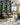 Loloi Rugs Elixir EH-03 grey and navy rug with intricate pattern, shown on a wooden floor in a cozy, stylish room setting.
