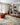Loloi Rugs Elixir EH-08 Silver and Multi rug with intricate patterns, shown in a cozy room setting with furniture.