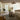 Loloi Rugs Heirloom HQ-06 BONE and CHARCOAL rug showing intricate pattern and soft woven texture in a cozy interior setting