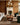 Loloi Rugs Heritage HER-02 BARK and MULTI rug with intricate patterns, displayed on a wooden floor in a cozy living room setting.