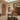 Loloi Rugs Heritage HER-02 Bark and Multi rug with intricate patterns and warm tones, displayed on a wooden floor.
