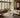 Loloi Rugs Heritage HER-12 blue and rust area rug shown in a room setting with furniture and décor.