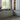Loloi Rugs Sonnet SNN-07 Charcoal and Mist rug with intricate pattern, shown in a cozy living room setting