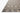 Sonya rug by Loloi Rugs in stone and natural colors, featuring a textured geometric pattern on plush woven fabric.
