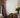 Loloi Rugs Villa VW-01 Rust rug with a warm, textured design, displayed on a wooden floor in a cozy living space.