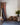 Loloi Rugs Villa VW-01 Rust rug with a warm, textured design, displayed on a wooden floor in a cozy living space.