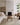 Loloi Rugs Wylder WYL-02 ivory and bark woven rug displayed in a cozy room setting.