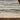 KAS beige and grey landscape rug, 2.2 x 7.6-foot runner with scenic design and textured surface.