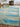 KAS Illusions 6222 Ocean Breeze rug featuring a soft blue and beige abstract pattern on plush textile.
