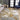 KAS Luna 7149 Gold and Grey Watercolors rug showing a soft, textured design in gold and grey tones on a neutral background.