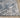 Blue and ivory KAS Landscapes 5910 Mirage rug with intricate patterns, displayed on a neutral floor.
