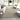 KAS Serenity 1256 Sand Tempo rug featuring a soft beige and tan geometric pattern, made of durable woven material.