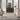 Nourison Silk Shadows SHA02 silver rug with intricate pattern, 8x10 feet, in a modern living room setting.