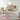 Nourison Prismatic PRS34 Ivory rug with geometric pattern in 8x10 size displayed in a living room setting