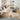 Nourison Prismatic PRS35 Sand rug featuring a modern geometric design in beige and tan tones on a neutral background.