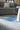 Nourison Prismatic PRS39 Blue rug with geometric patterns, 8x10 feet, featuring shades of blue and intricate design details.