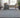 Nourison Silk Shadows SHA18 grey and blue rug with intricate pattern, soft texture, and modern design for living room decor.