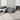 Silver grey Nourison Irradiant IRR04 rug with intricate pattern, rectangular shape, and plush texture in a modern design.