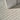 Nourison Notes NOT04 Ivory Grey rug with geometric patterns in soft ivory and grey tones, 3'11" x 5'11" size displayed on a neutral floor.