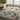 Nourison Prismatic PRS15 beige and multi-color rug with geometric pattern, measuring 3.9 x 5.9 feet, in a modern home setting.