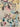 Nourison Prismatic PRS15 beige and multi-colored rug with geometric pattern, shown in 3'9" x 5'9" size.