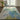 Seafoam Nourison Prismatic PRS16 rug in 3'9" x 5'9" with a colorful, geometric pattern on a soft surface.
