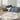 Calvin Klein Infinity rug in ivory, grey, and blue by Nourison, 4x6 feet with intricate geometric patterns and soft texture.