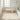 Nourison Billows BIL01 ivory beige rug in a cozy living room setting, showcasing soft texture and elegant design.