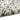 Nourison Billows BIL01 ivory and black rug with a textured, patterned design in a 5'3" x 7'3" size.