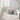 Nourison Wander WND01 grey rug in a cozy living room setting, showcasing its soft texture and modern design.