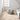 Nourison Wander WND01 Natural rug in a cozy living room setting, showcasing its soft texture and neutral tones.