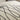 Nourison Christopher Guy Wool & Silk CGS09 Sea Sand round rug with soft, luxurious fibers in a sandy beige color.