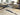 Round Nourison Christopher Guy Wool and Silk Rug CGS11 Sea Sand with soft, textured beige and sandy tones.