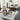 Round Nourison Christopher Guy Wool & Silk CGS19 Silvery Moon rug with a soft, luxurious design in shades of silver and moonlight.