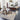 Round Nourison rug featuring Christopher Guy Wool & Silk CGS29 Ash design with intricate patterns and soft texture.
