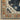 Indoor rug from Oriental Weavers, Andorra 2281E, featuring intricate patterns in neutral tones, measuring 10x3.2 feet.