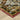 Indoor rug by Oriental Weavers, Andorra / 2408A, featuring intricate pattern in shades of blue and beige on a textured surface.