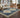Indoor rug by Oriental Weavers, Andorra / 2430A, featuring intricate patterns in neutral tones, measuring 10 x 3.2 feet.