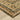 Indoor rug from Oriental Weavers, Andorra 2431A, 10x3.2 feet, featuring intricate patterns and soft textile in natural tones.