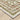 Indoor rug by Oriental Weavers, Andorra 3717A, with intricate pattern in neutral tones, measuring 1.10 x 3.2 meters.