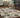 Indoor rug from Oriental Weavers, model Andorra 7129A, featuring a detailed geometric pattern in neutral tones.