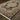 Indoor rug by Oriental Weavers, Masterpiece 5501K, with intricate patterns in warm tones, measuring 2.3 x 10 feet.