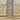 Oriental Weavers Bauer 90N indoor rug with a geometric pattern, measuring 2.3 by 7.6 feet, in earthy tones.