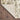 Indoor rug by Oriental Weavers, Bowen 2067W, featuring a detailed pattern in neutral tones, measuring 2.3 x 7.6 feet.