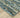 Indoor rug by Oriental Weavers, Reed RE01G, 2.3 x 7.6 feet, featuring a detailed geometric pattern on a neutral background.