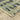 Indoor rug by Oriental Weavers, Reed RE07B, measuring 2.3 x 7.6 feet, with a detailed pattern and neutral color palette.