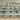 Indoor rug by Oriental Weavers, Reed RE07B, featuring a woven pattern in neutral tones, measuring 2.3 x 7.6 feet.