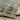 Indoor rug by Oriental Weavers, Reed RE07B, 2.3 x 7.6 feet, featuring a detailed pattern in neutral tones.