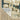 Indoor rug by Oriental Weavers, Reed RE11Q, 2.3 x 7.6 feet, featuring intricate patterns and warm earthy tones.